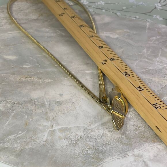Hong Kong faux buckle gold tone serpentine stretch belt. - Picture 5 of 5